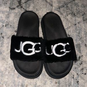 Women’s suede UGG slides.